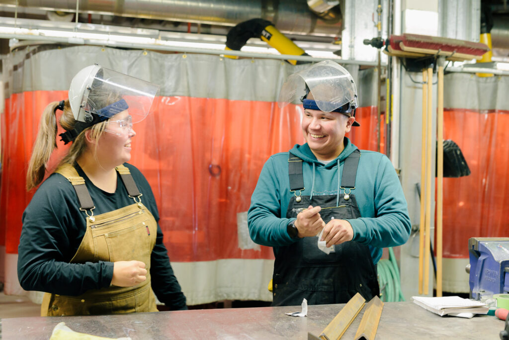 pipe trades two laugh image on The Story of Trade Winds to Success: Building Lives, Careers, and Alberta’s Economy